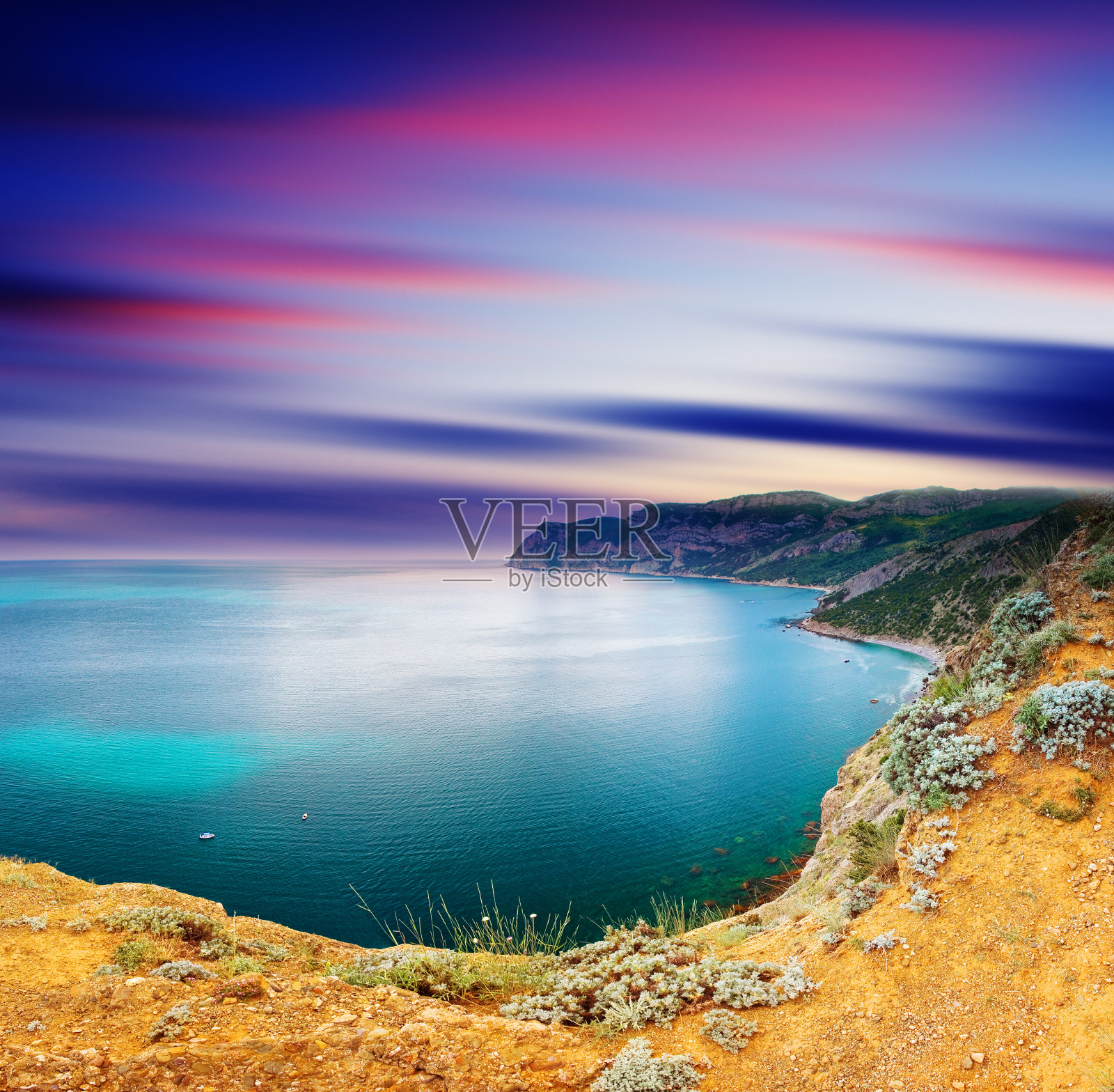 美丽的大海和云彩天空与太阳照片摄影图片