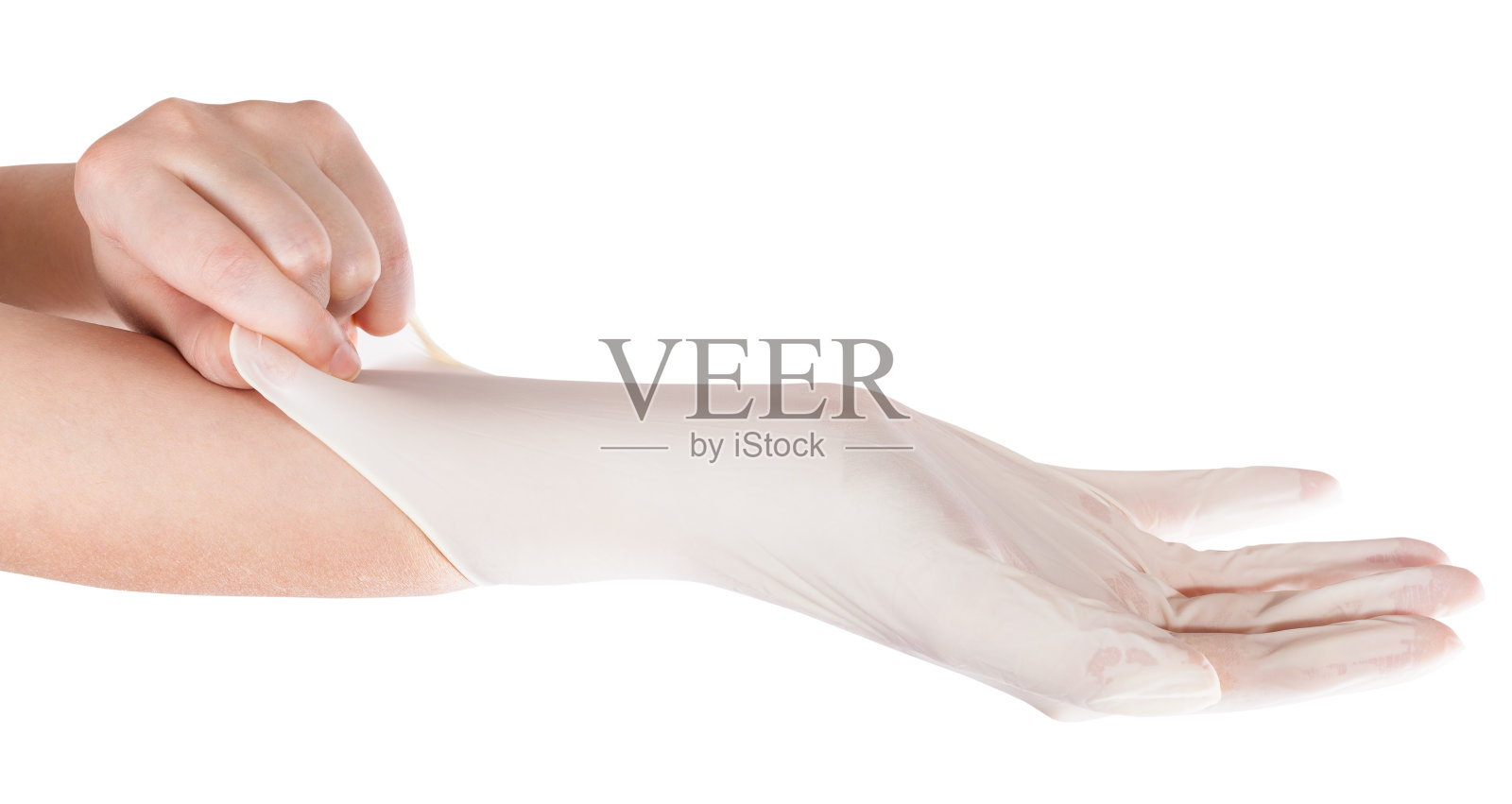 手的侧面戴上乳胶手套照片摄影图片