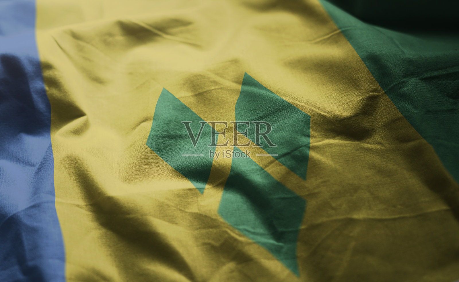 圣文森特和格林纳丁斯皱巴巴的旗帜近距离特写照片摄影图片