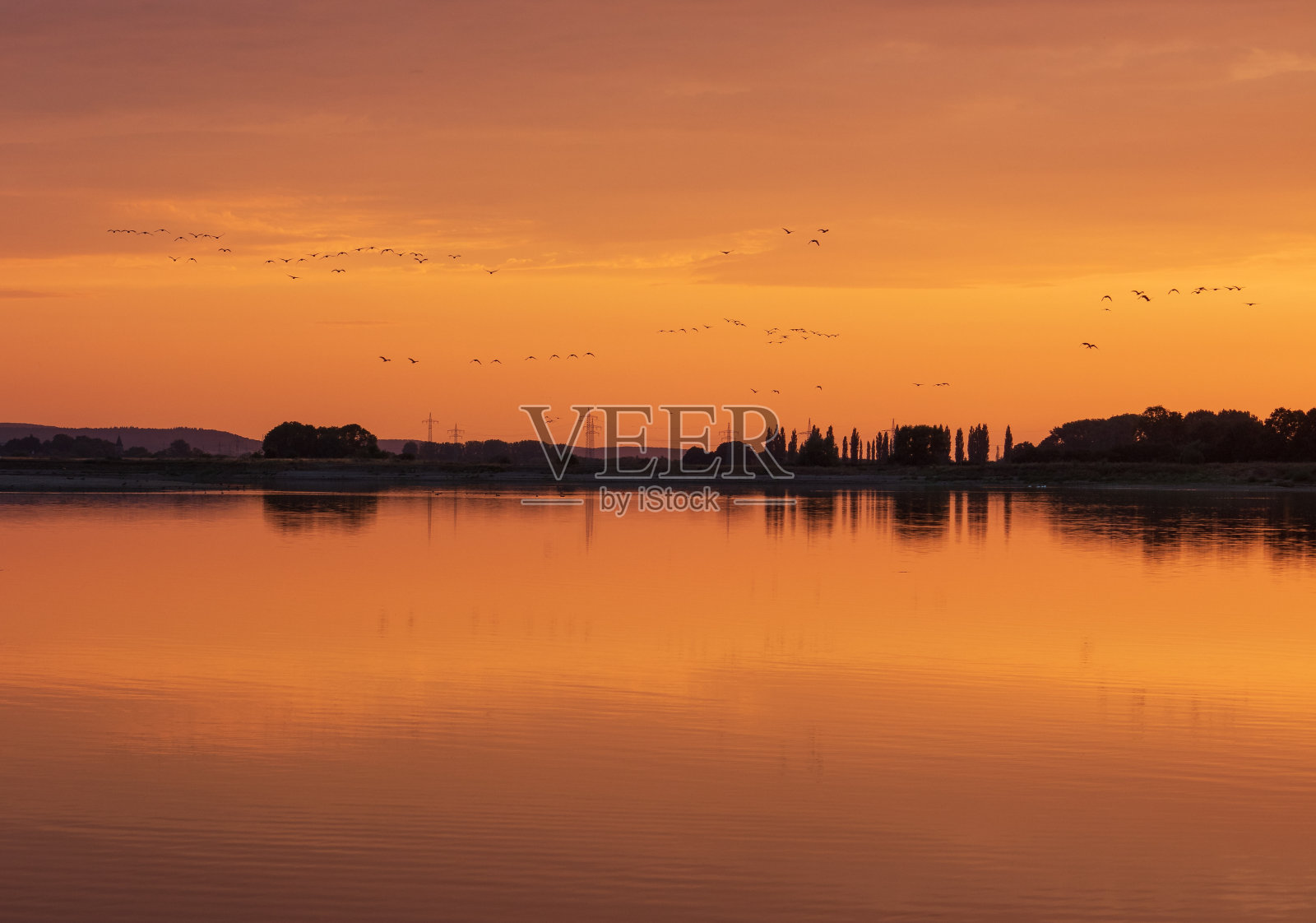 德国霍亨罗德湖上的日落照片摄影图片