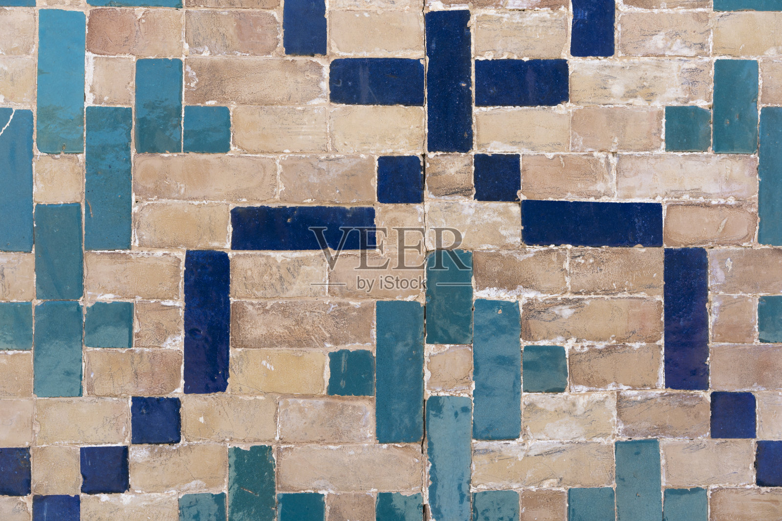 在布哈拉，乌兹别克斯坦，装饰清真寺的正面与石头瓷砖雕刻图案。照片摄影图片