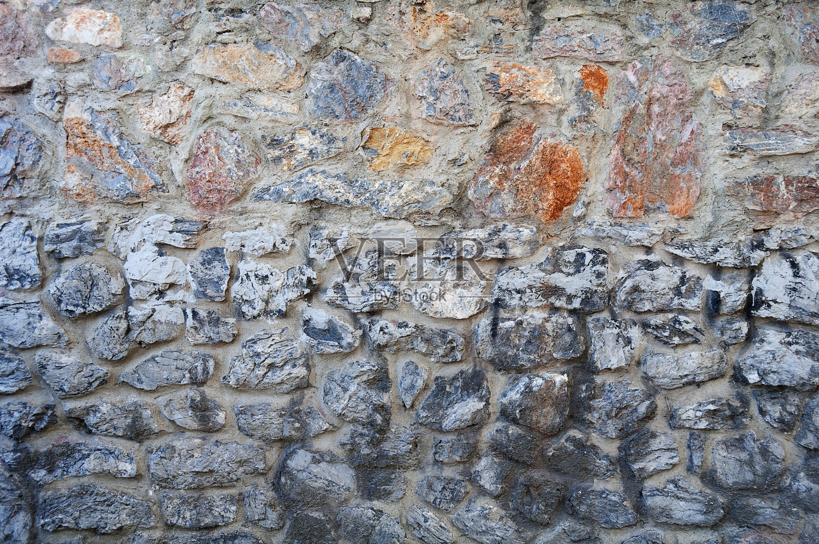 用彩色石头砌成的旧墙照片摄影图片