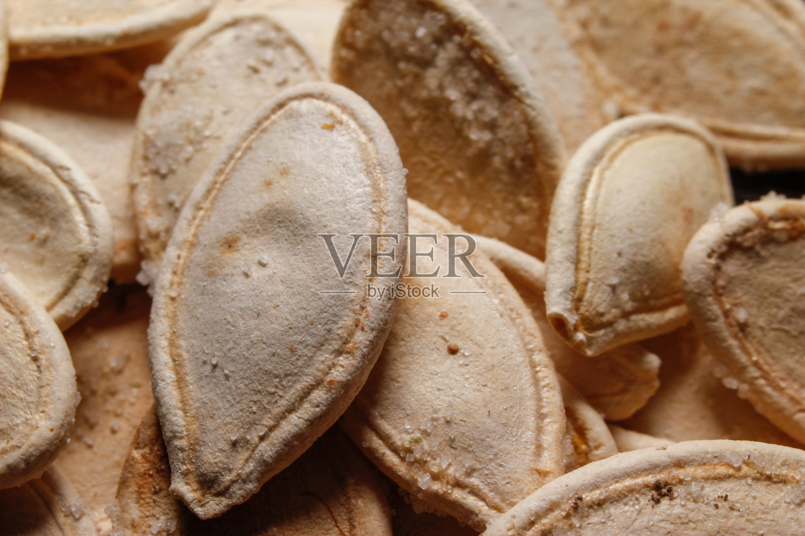 烤和腌制的南瓜子照片摄影图片