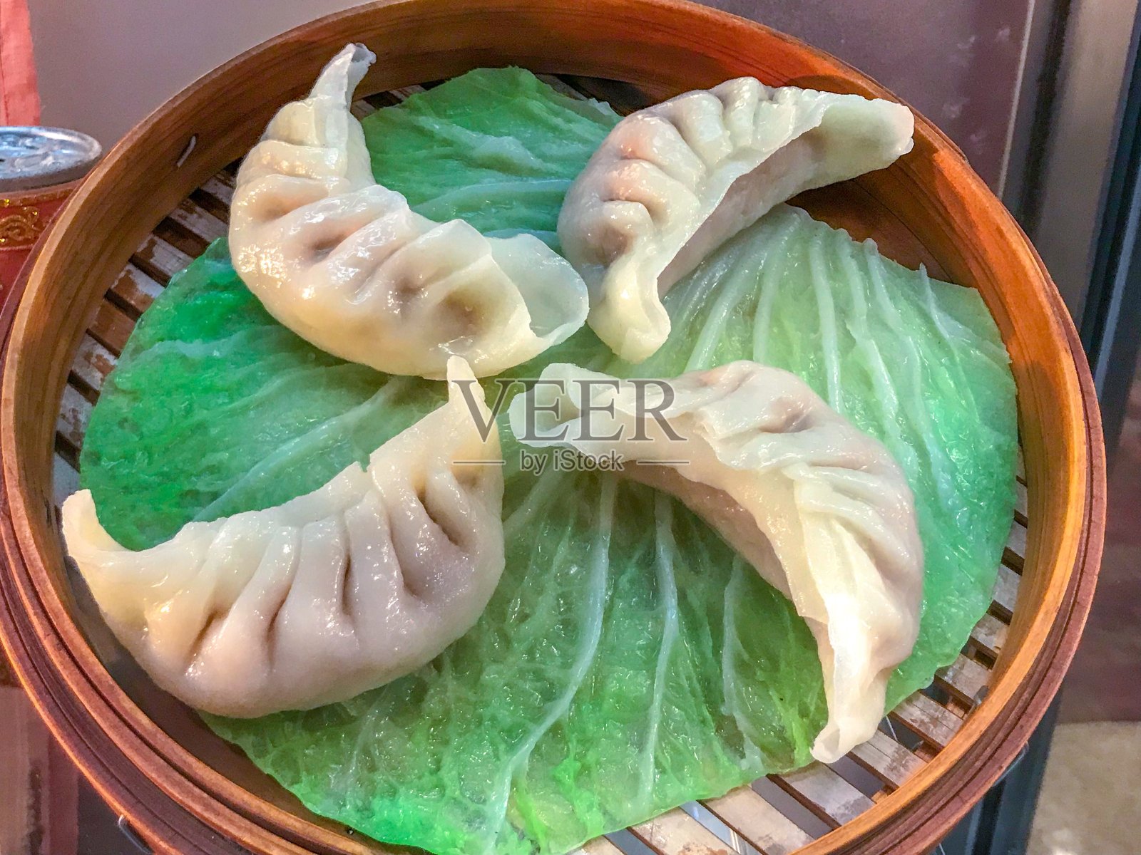 食物模型蒸饺子(中国饺子)在蒸汽照片摄影图片