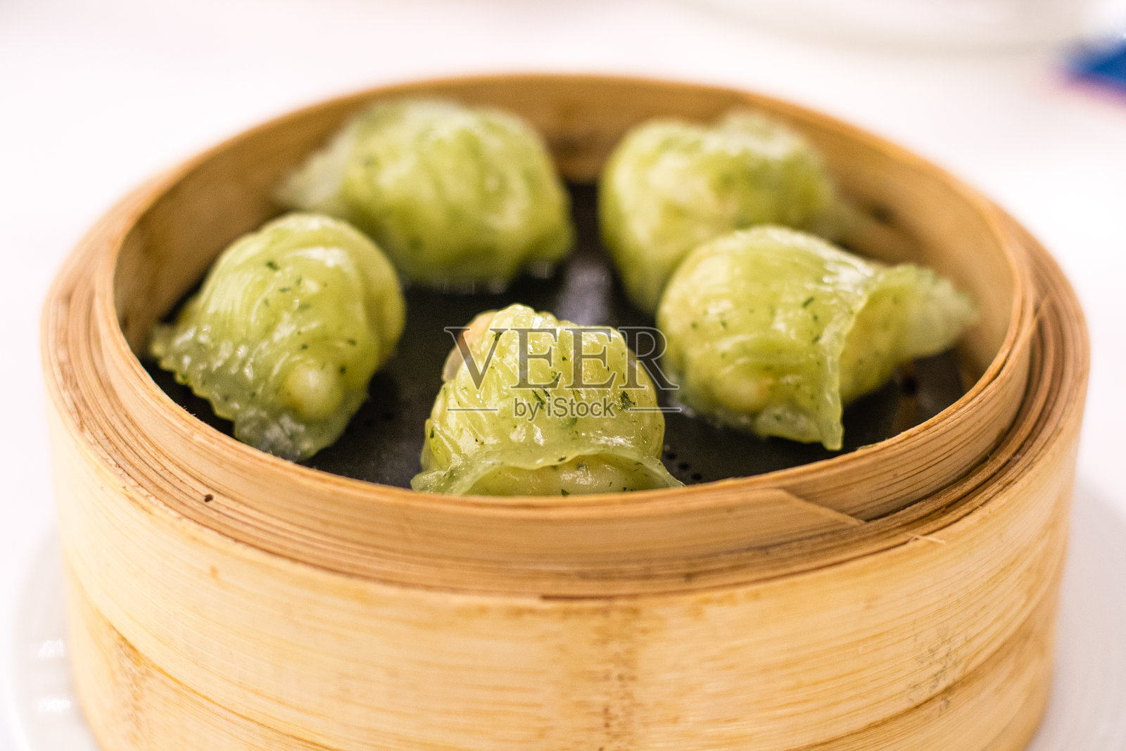 罗勒蒸虾饺照片摄影图片