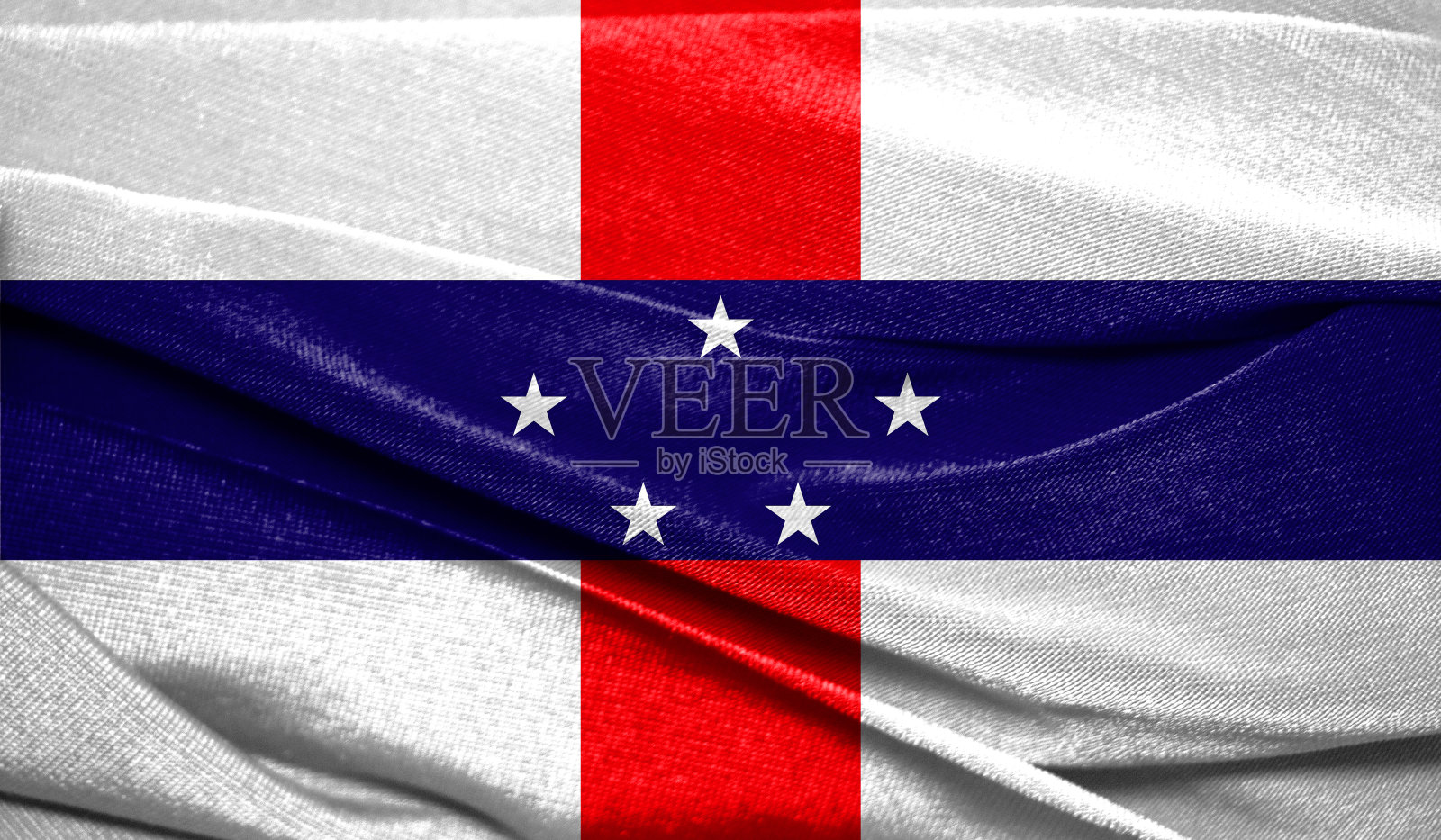 现实的旗帜荷属安的列斯在波浪表面的织物。完美的背景或纹理目的照片摄影图片