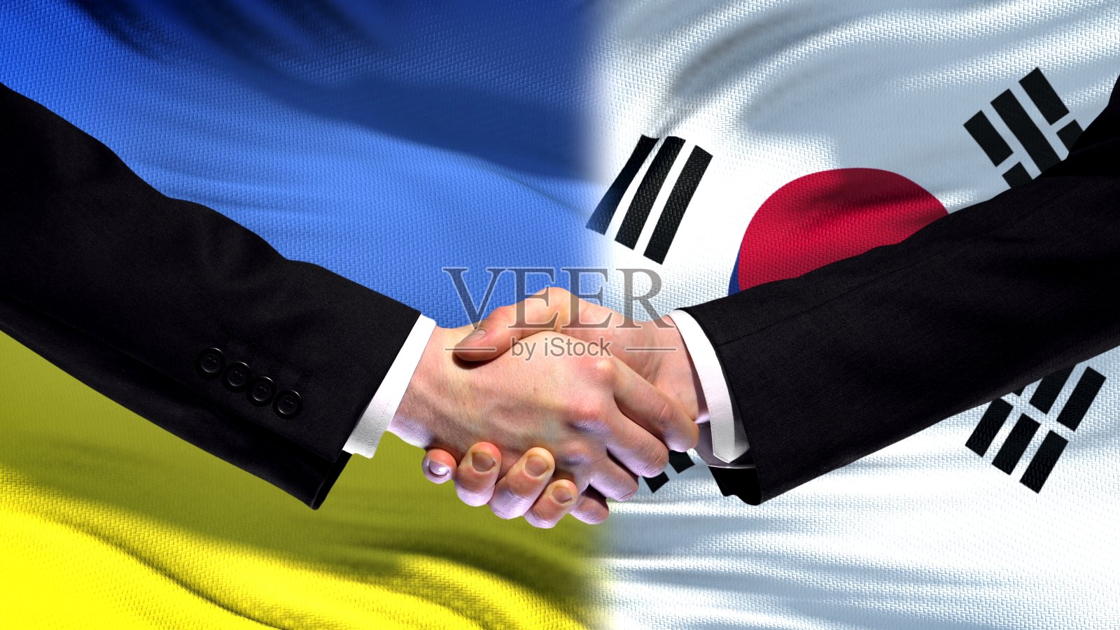 乌克兰和韩国握手，国际友谊，国旗背景照片摄影图片