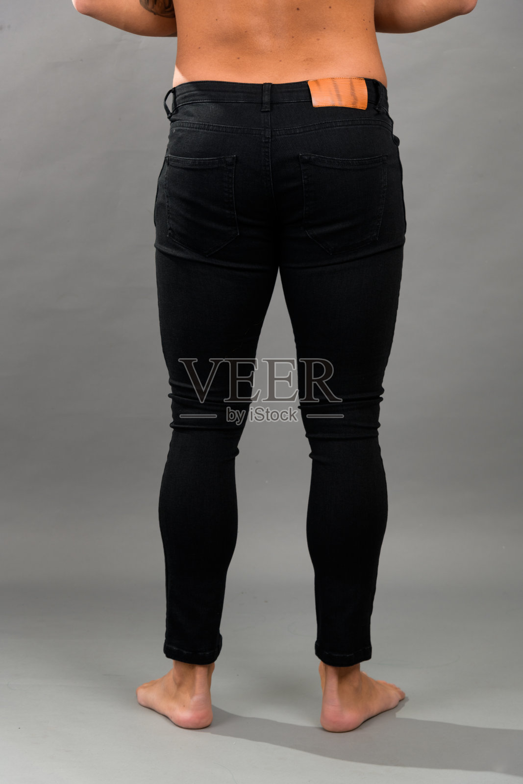 现代男性无品牌黑色紧身牛仔裤照片摄影图片