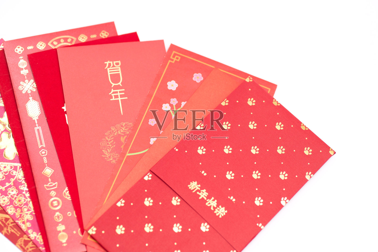 春节的红包，白色背景上写着“新年好”的红包照片摄影图片