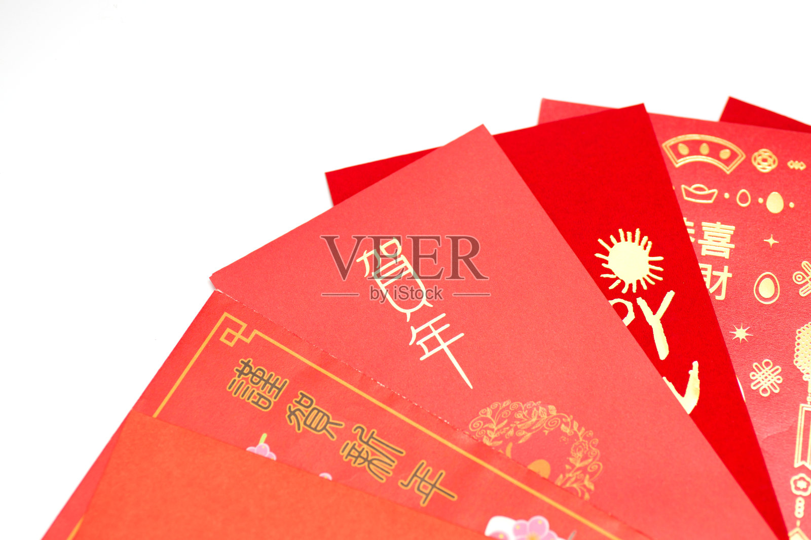 春节的红包，白色背景上写着“新年好”的红包照片摄影图片
