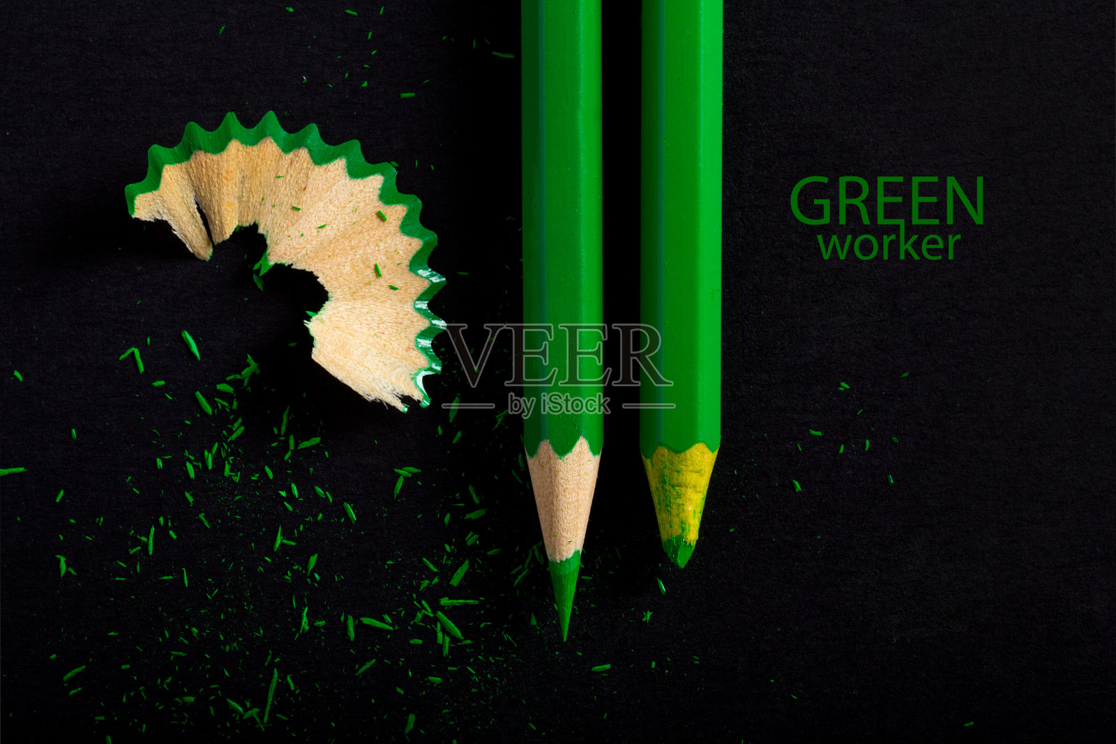 艺术概念对比工作劳动指示剂铅笔绿色。在下班之前照片摄影图片