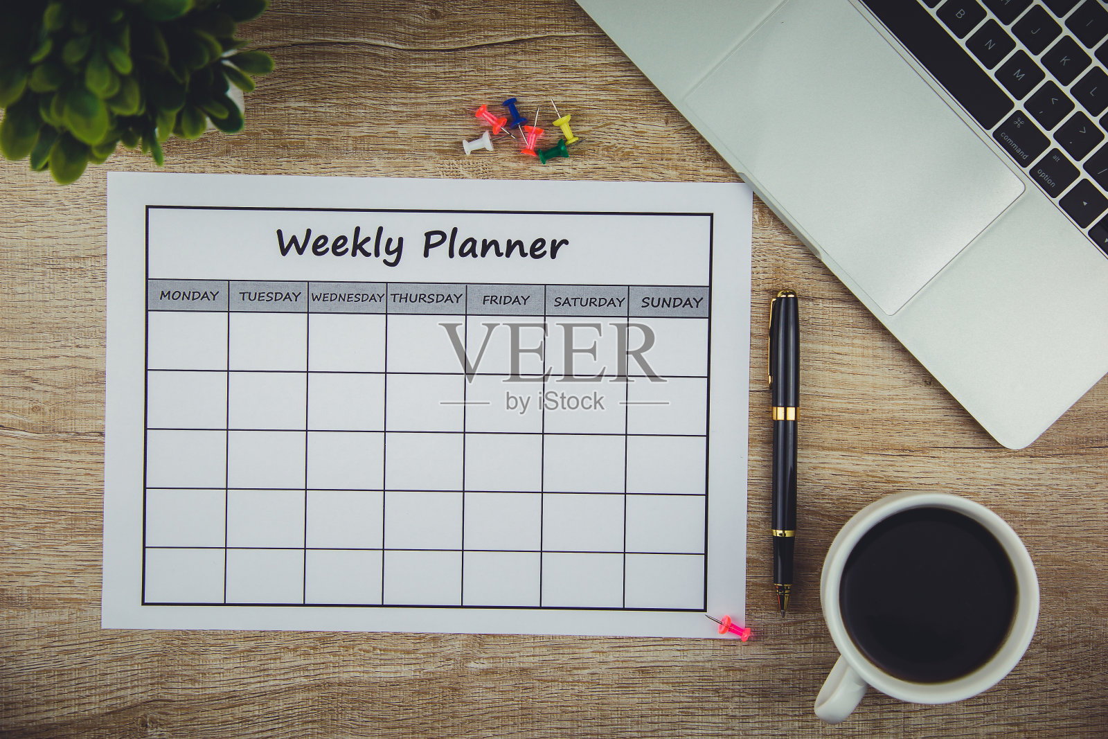 每周计划一周内的业务或活动。照片摄影图片