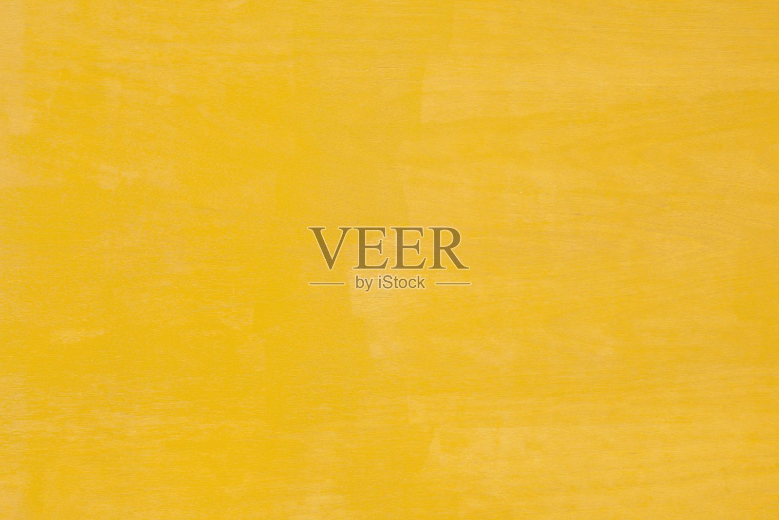 黄色墙壁抽象背景。照片摄影图片