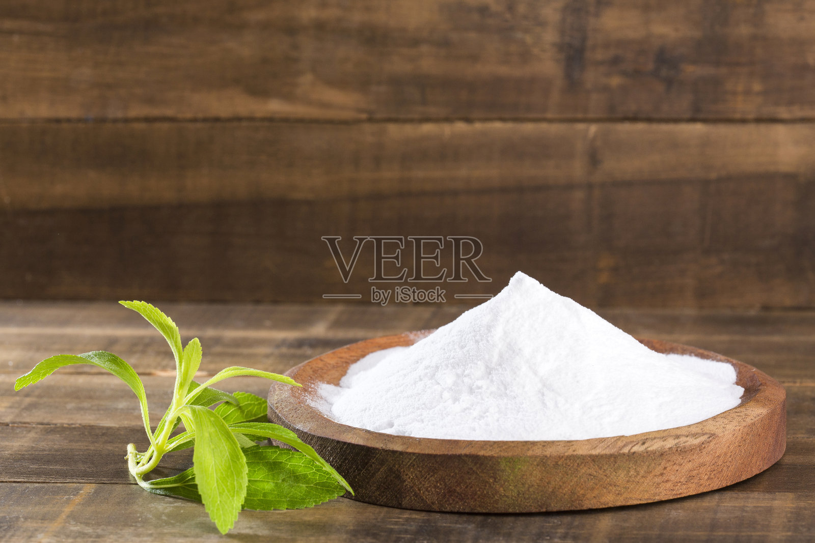 甜菊属植物粉末中的天然甜味剂——甜菊照片摄影图片