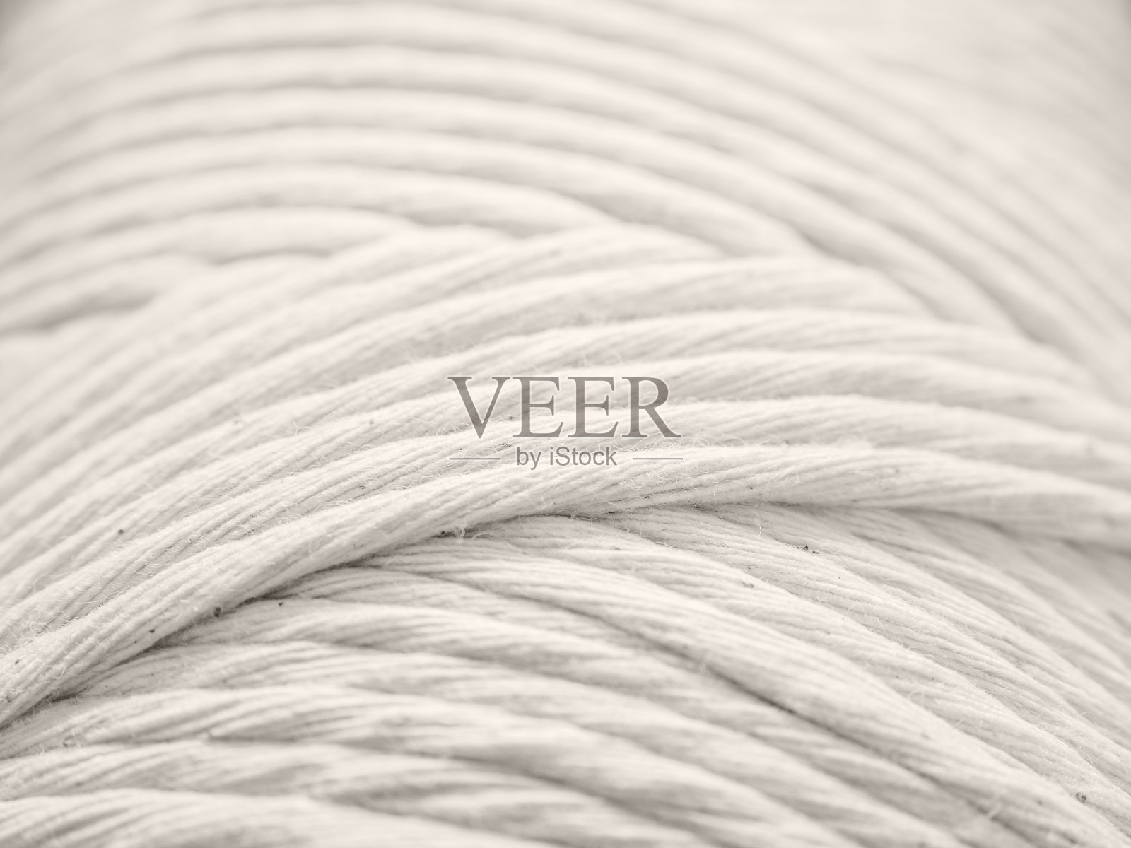 流苏用的棉线。绞特写镜头。白色背景照片摄影图片