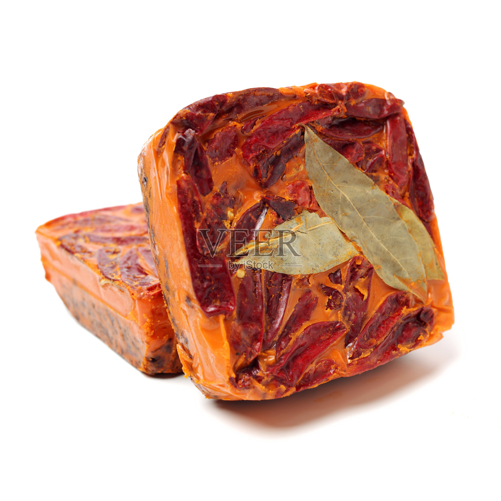 中国麻辣火锅底料上的白色背景照片摄影图片