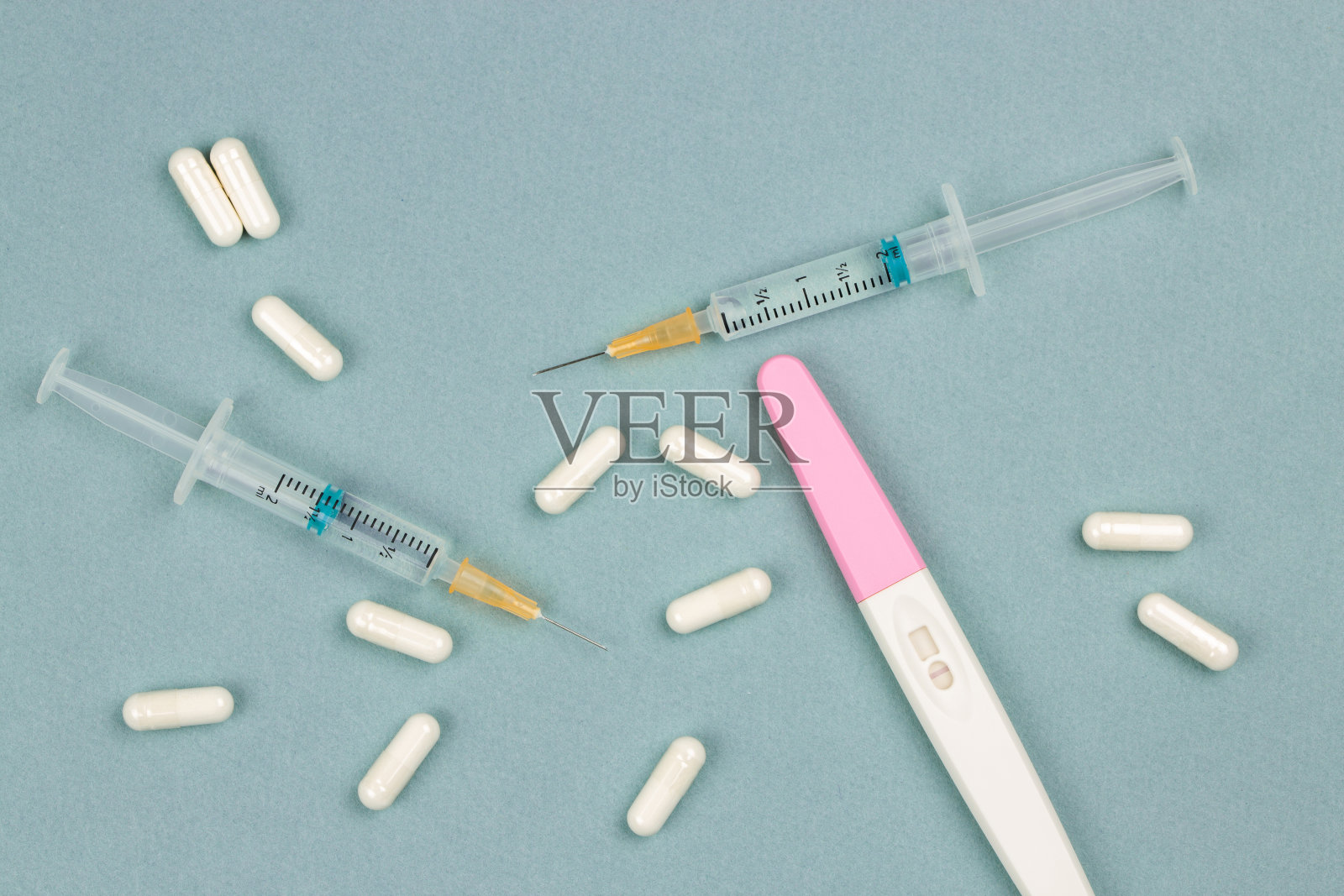 治疗男性或女性不孕症。妊娠试验阳性照片摄影图片