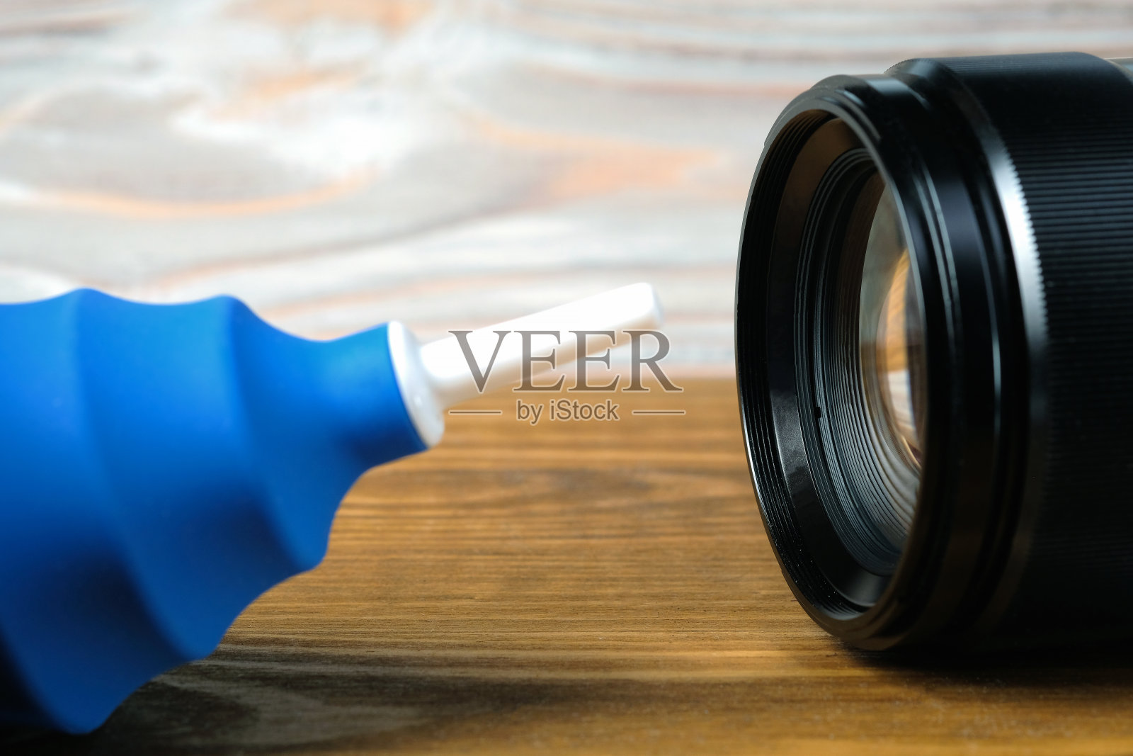 清洁相机和照片镜头的气泵。照片摄影图片