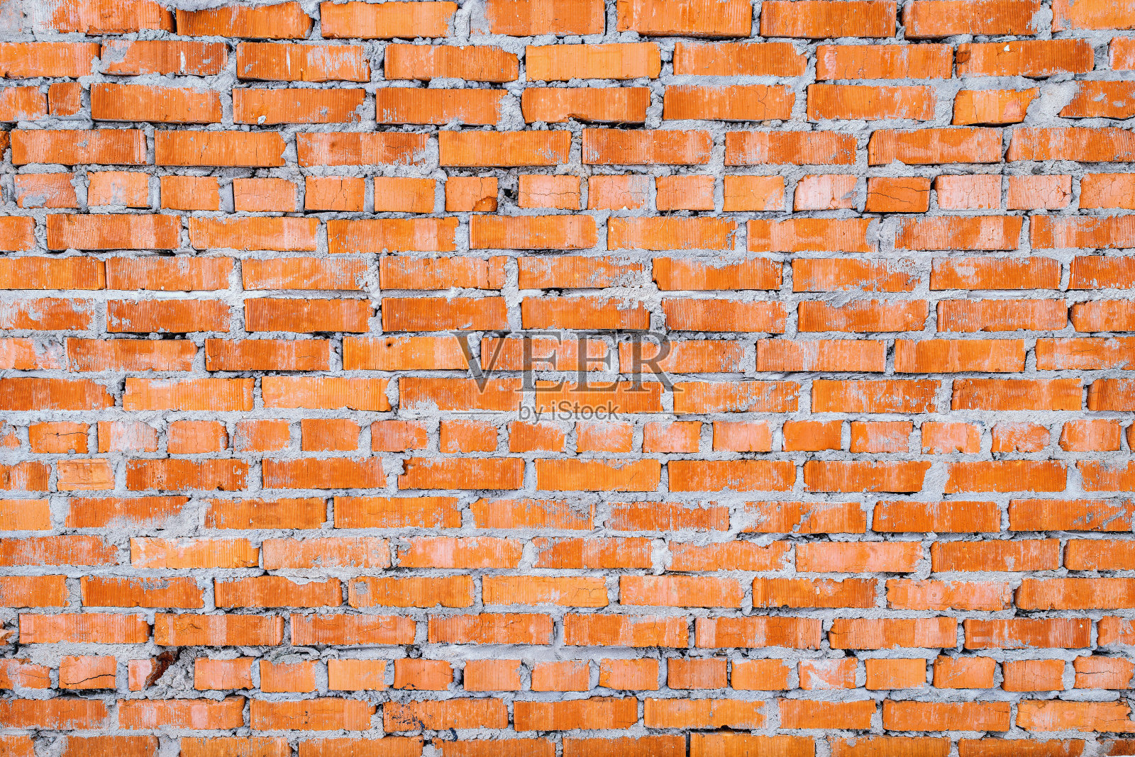 白天红色的砖墙背景。照片摄影图片