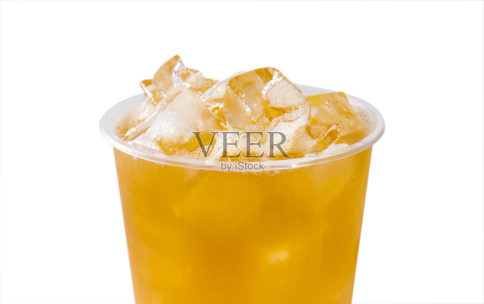 橙汁里装满了冰块照片摄影图片