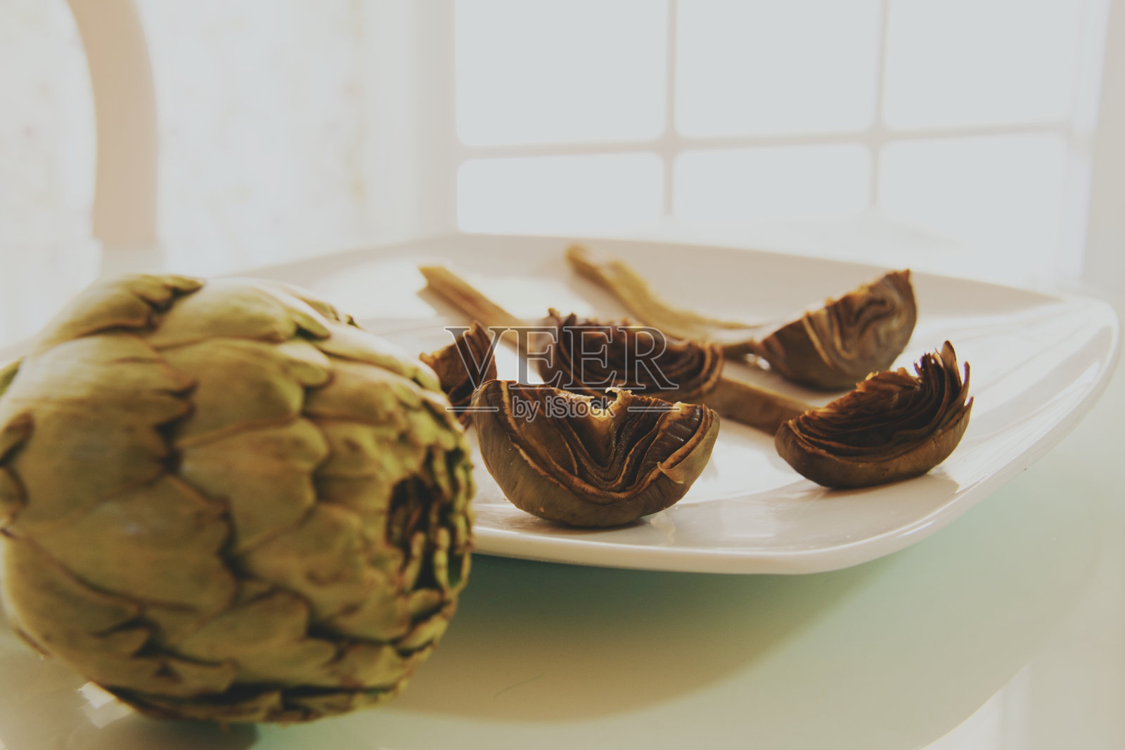 素食:蒸洋蓟照片摄影图片