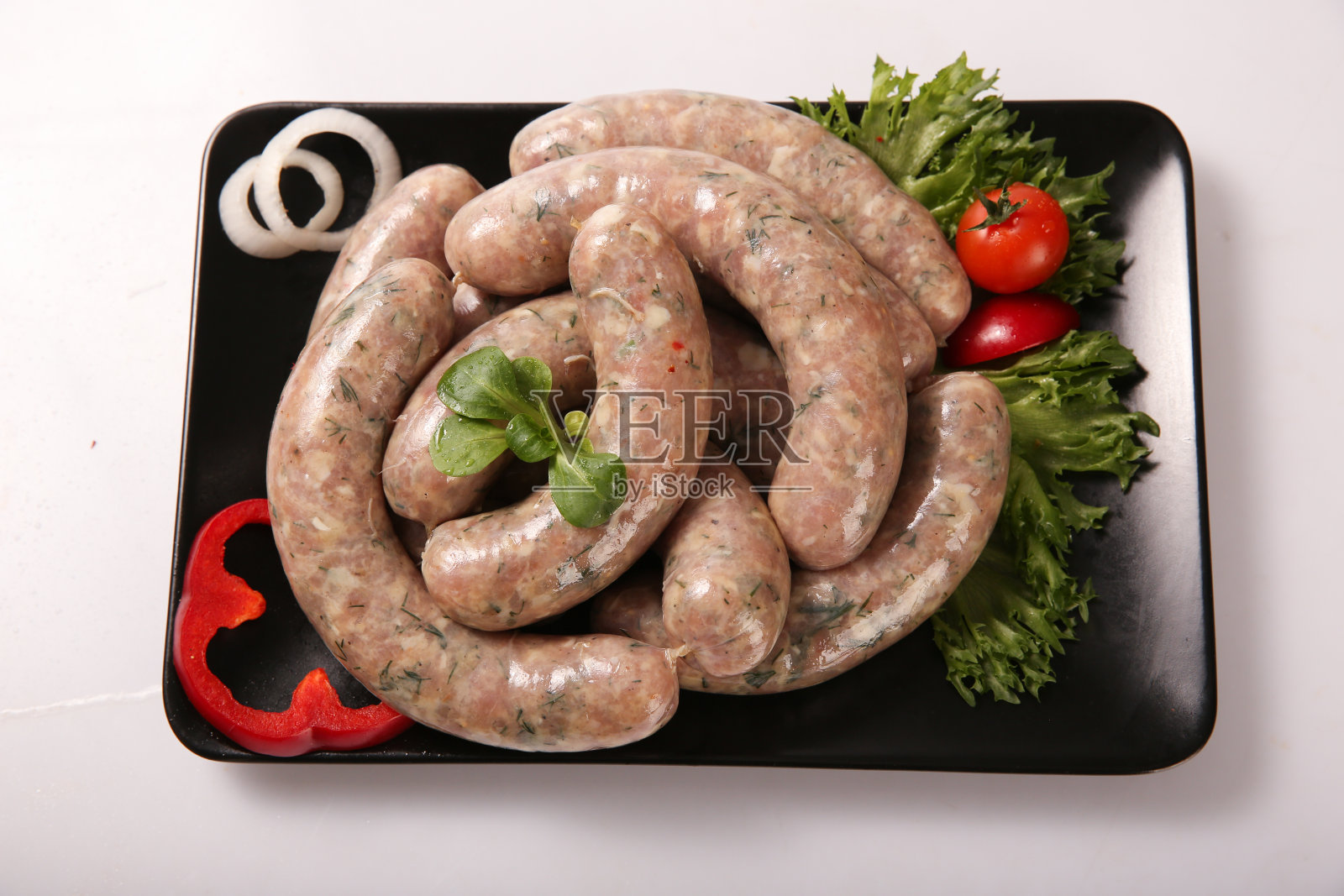 生烤香肠。照片摄影图片