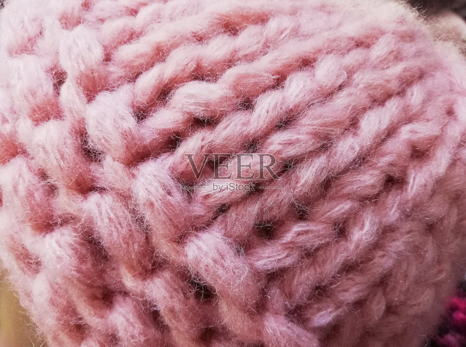 背景质地柔软，花纹细腻。粉红色的颜色。特写，选择性聚焦，复制空间。照片摄影图片