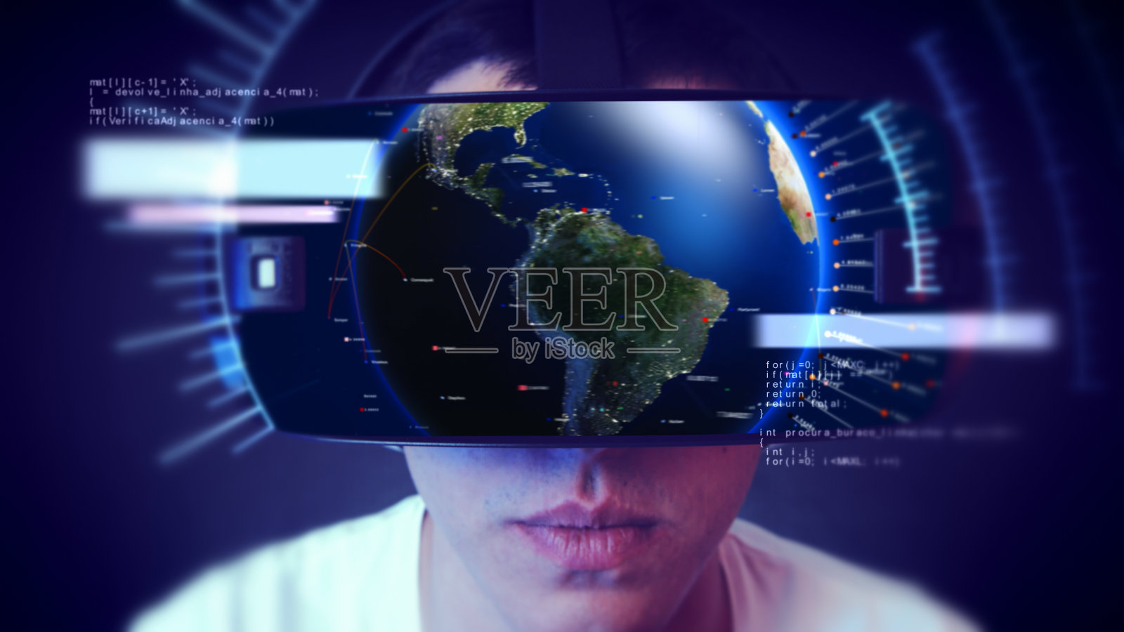 帅气的年轻人戴着VR头戴体验虚拟现实。照片摄影图片