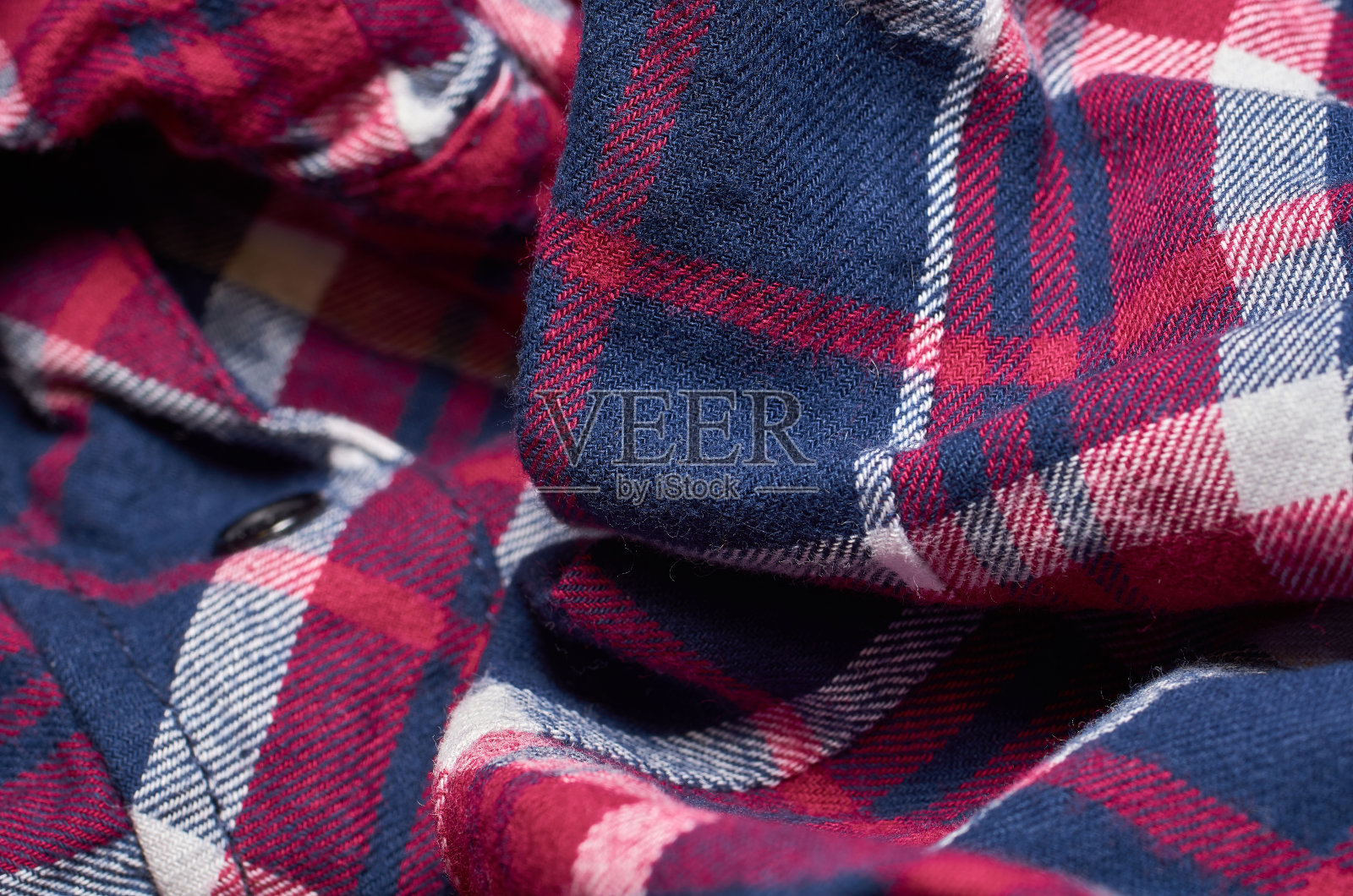 织物图案的微距照片，纺织品服装的近景与浅景深的领域照片摄影图片