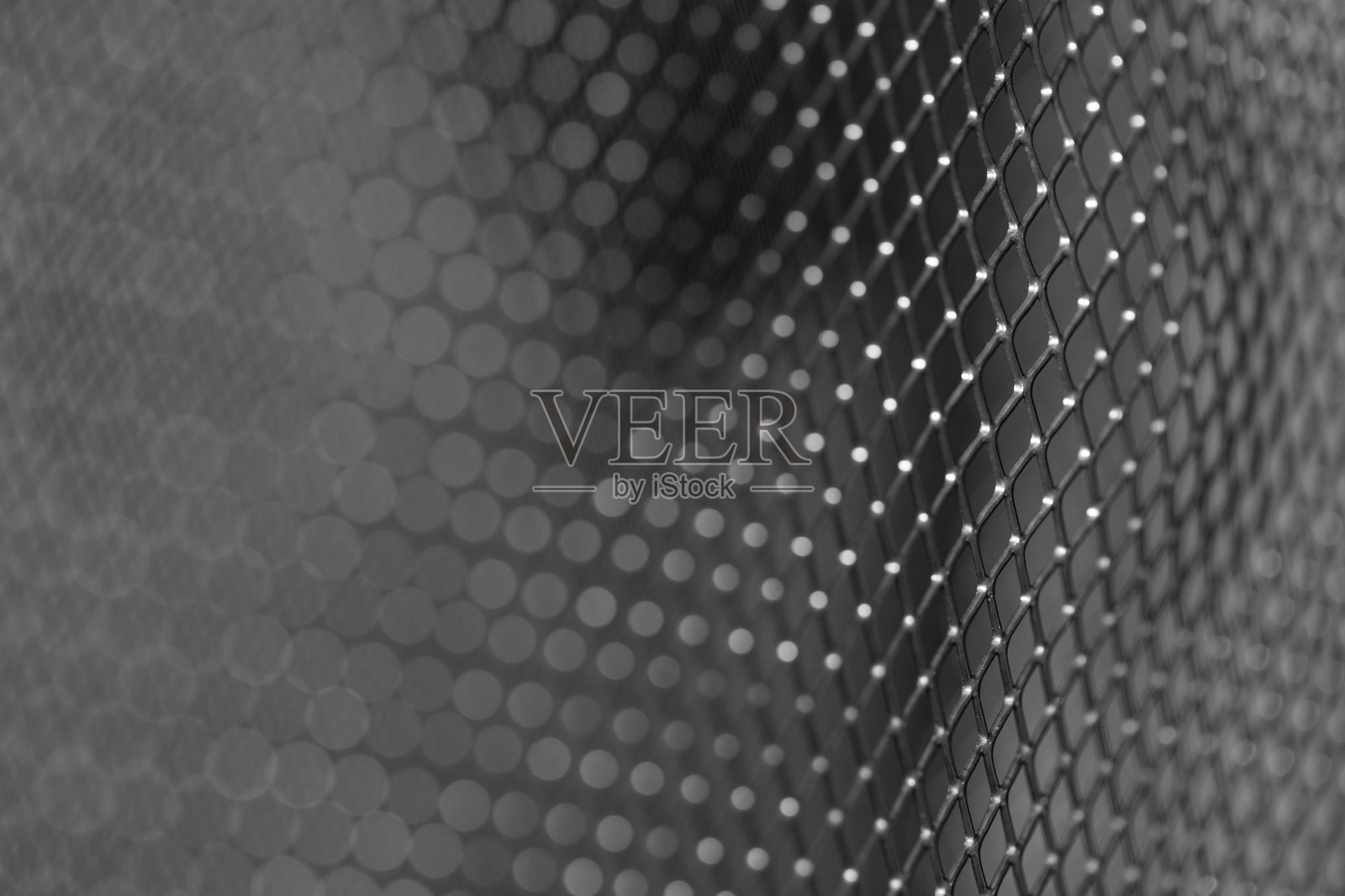 闪亮的金属网深色背景特写照片摄影图片