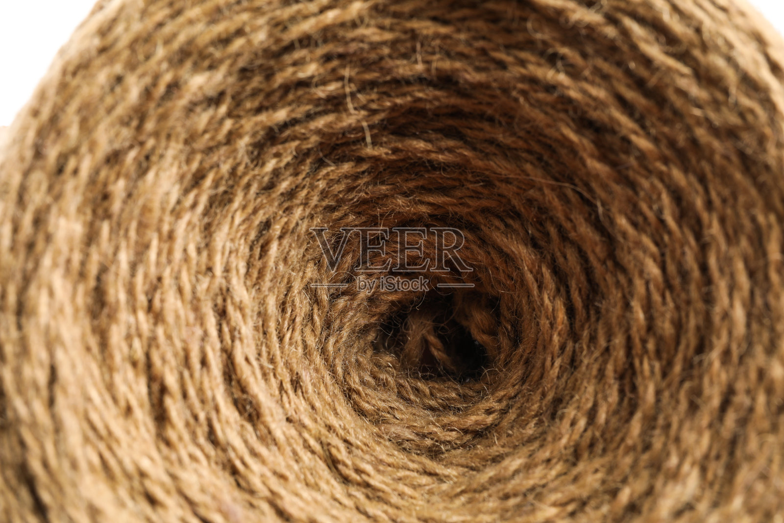 背景为麻绳线轴。有机材料照片摄影图片