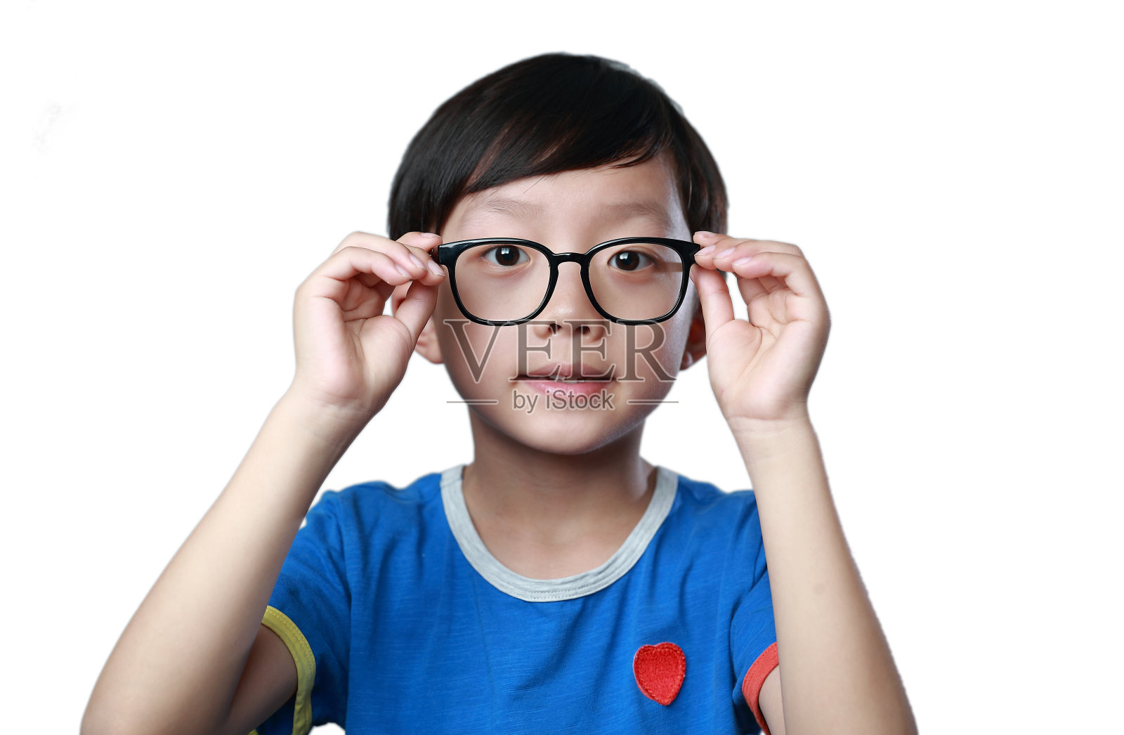 微笑男孩的肖像白色的背景照片摄影图片