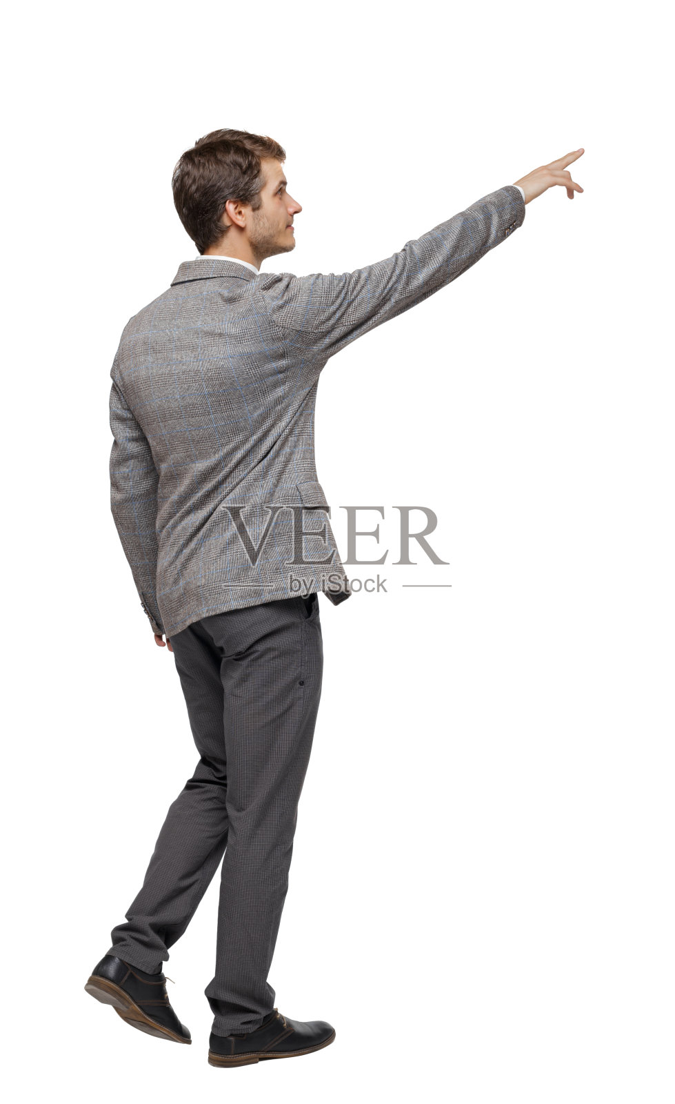 后视图的步行指向商人。照片摄影图片