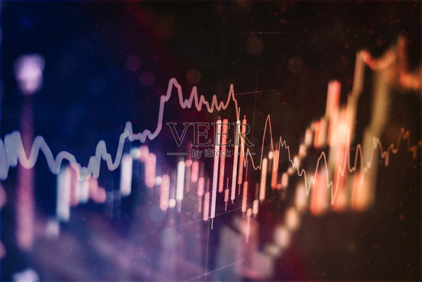 经济图表与股票市场图表，用于商业和金融概念和报告。抽象的蓝色背景。照片摄影图片