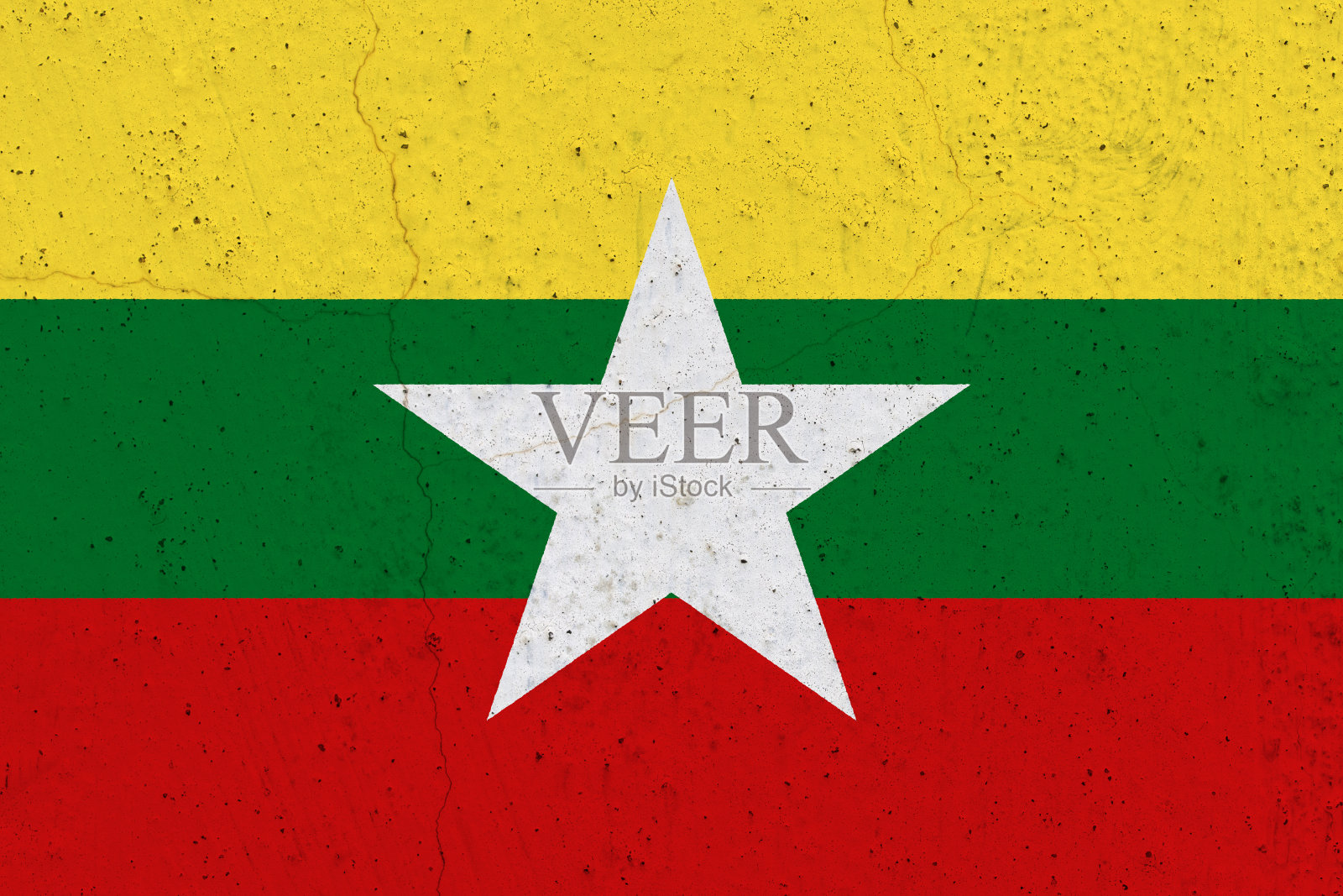 混凝土墙上挂着缅甸国旗照片摄影图片