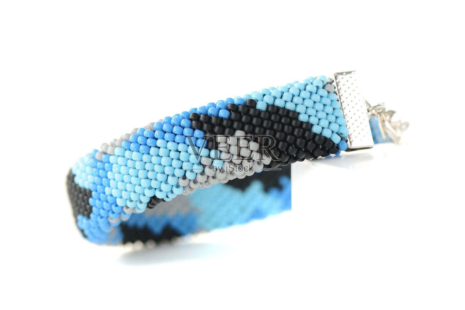 海军蓝色迷彩手镯孤立在白色背景近距离照片摄影图片