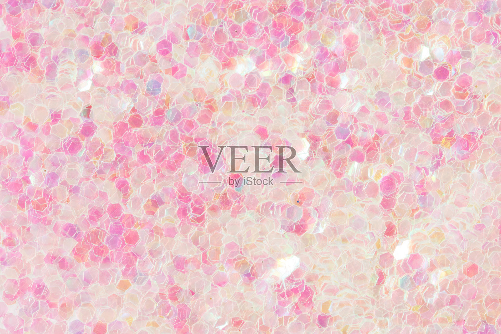 粉红色亮片-独有的纹理。微距照片的粉红色闪光为您的背景。照片摄影图片