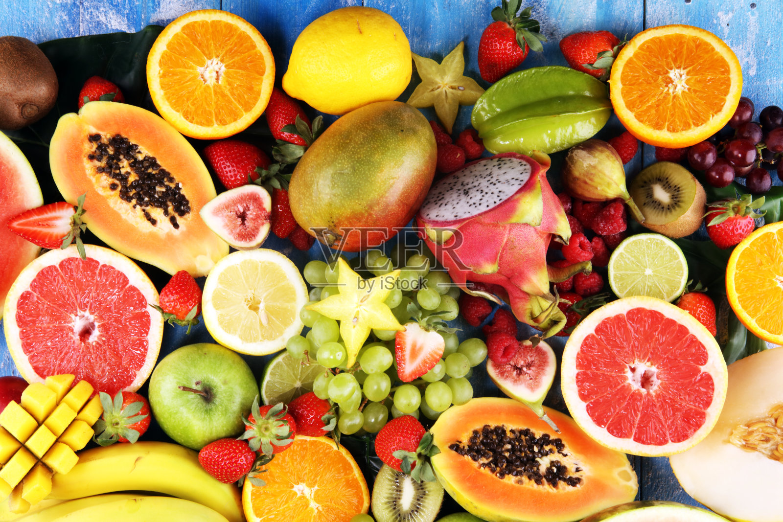 热带水果背景，许多色彩鲜艳的新鲜成熟的热带水果照片摄影图片