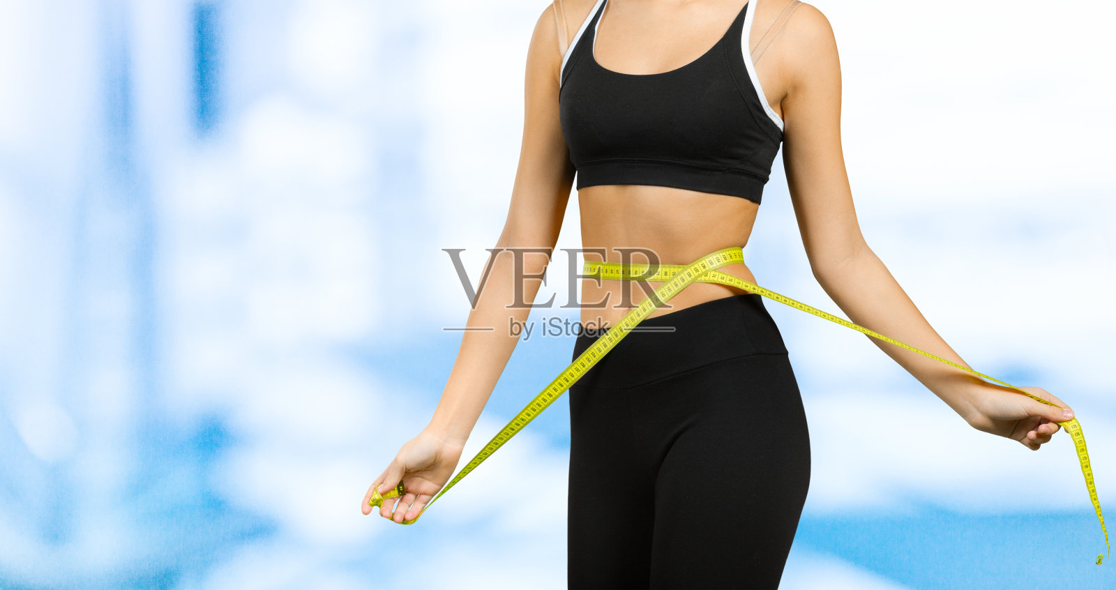 健身身体用胶带照片摄影图片