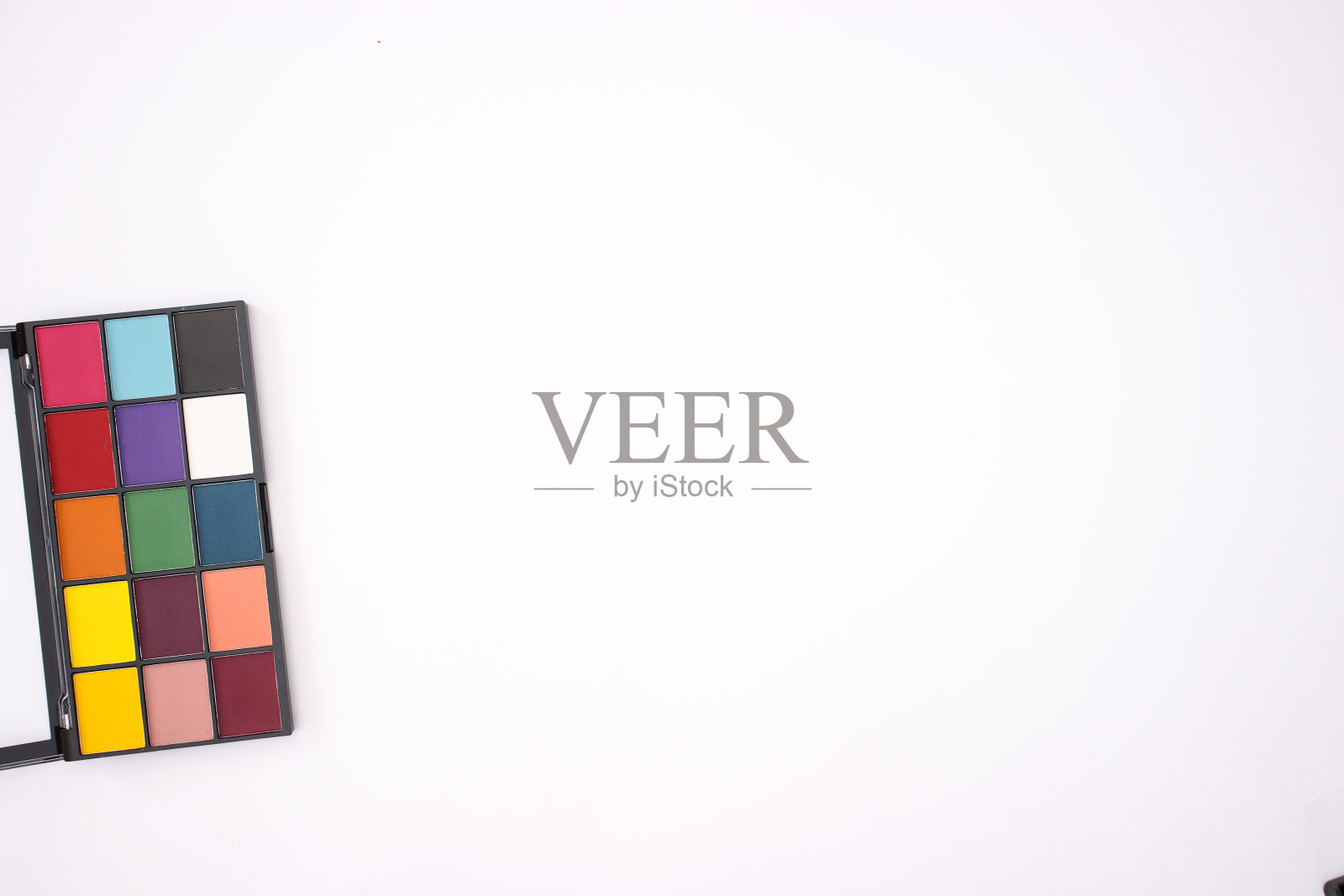 一个眼影调色板上的白色背景照片摄影图片