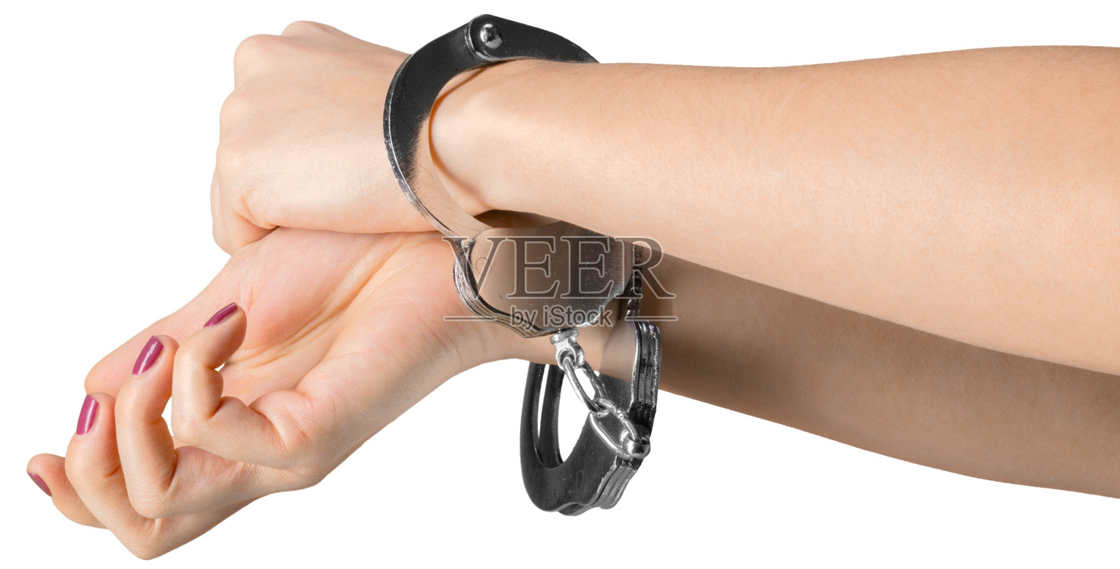 手戴手铐孤立在白色背景照片摄影图片