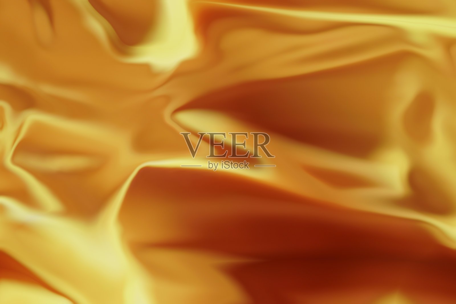 液体黄金光泽的背景。照片摄影图片