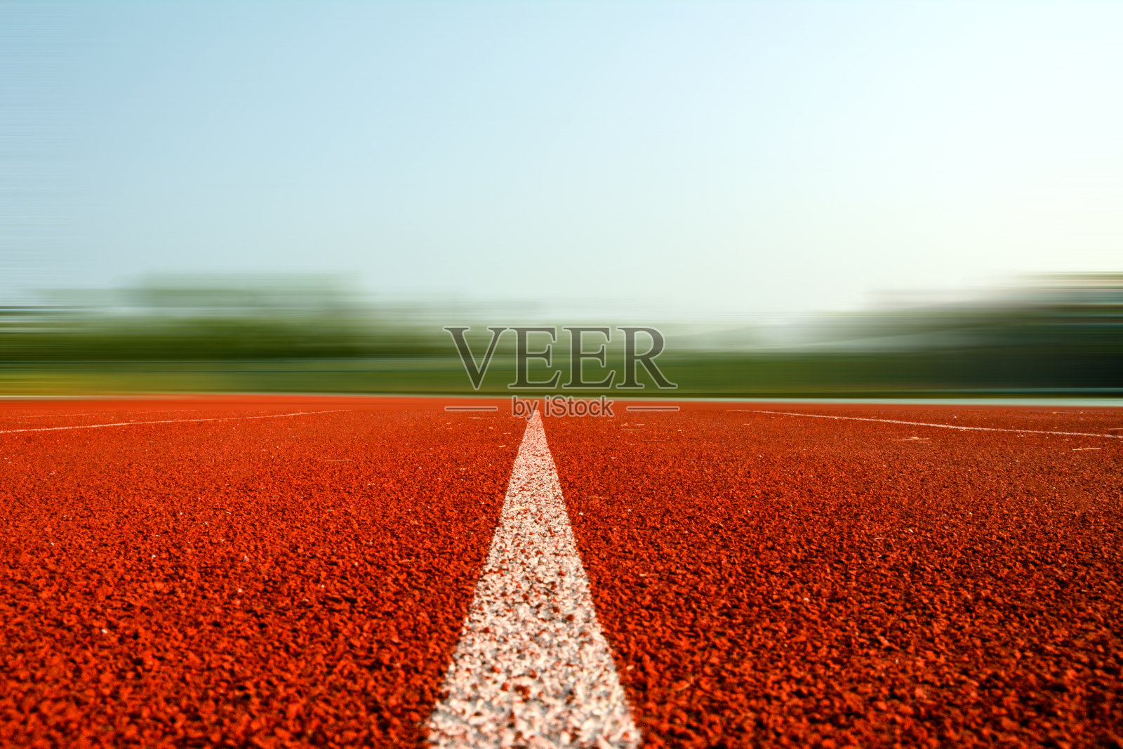 跑道为运动员背景，运动员跑道或跑道照片摄影图片