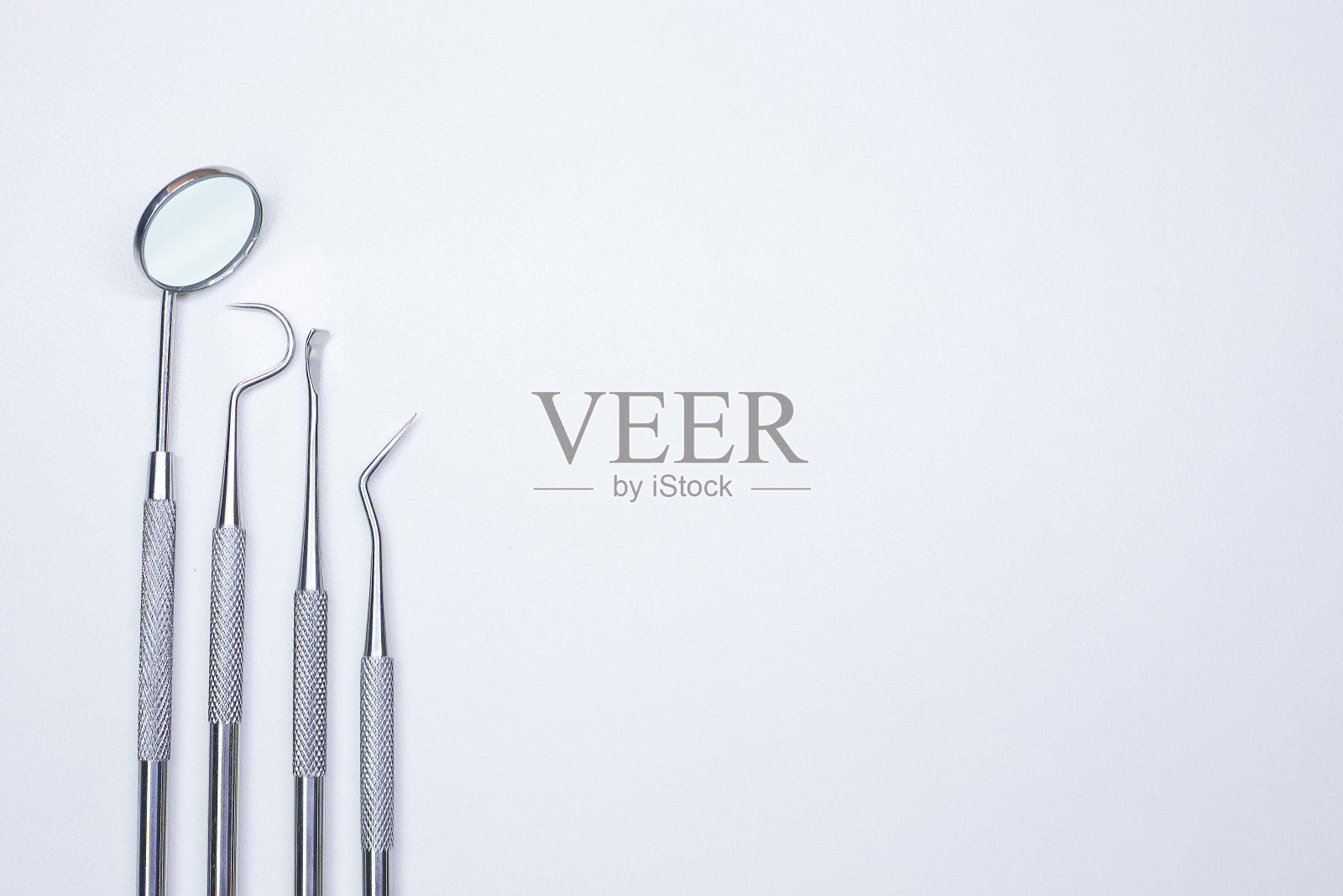 牙科设备上的白色背景特写图像。照片摄影图片