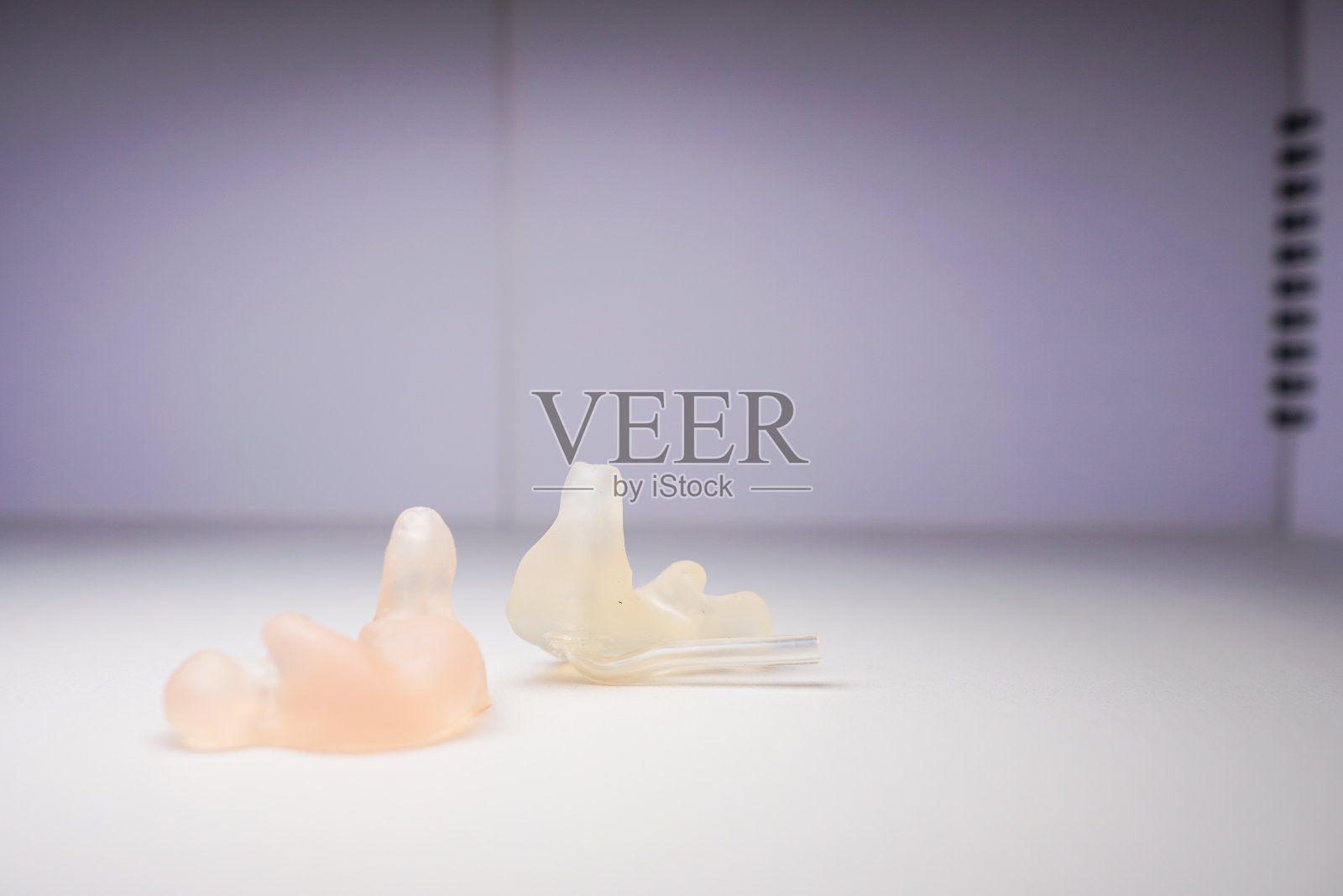 助听器使用的外壳模具。材料是硅树脂。类别包括贝壳，半贝壳，运河，运河船闸，CIC，骨架，开放配合。照片摄影图片