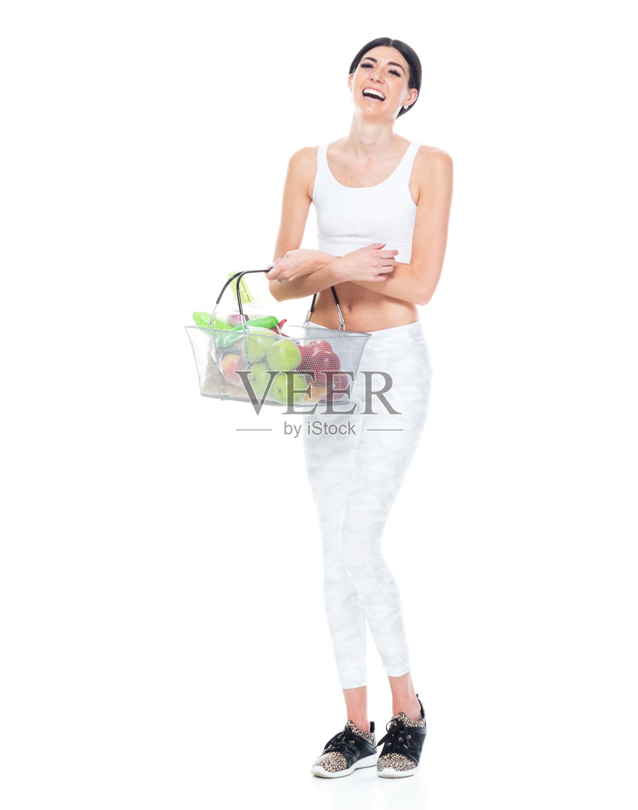 美丽的女性，长发，穿着运动服照片摄影图片