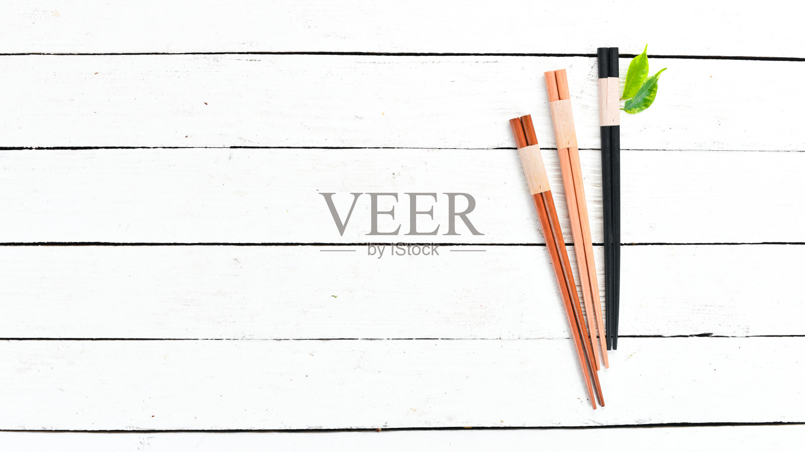 木筷子。一套筷子到亚洲美食俯视图。为你的文本留出空间。照片摄影图片