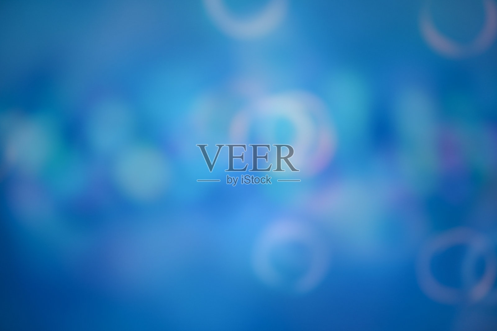 柔和的灯光，抽象的背景。照片摄影图片