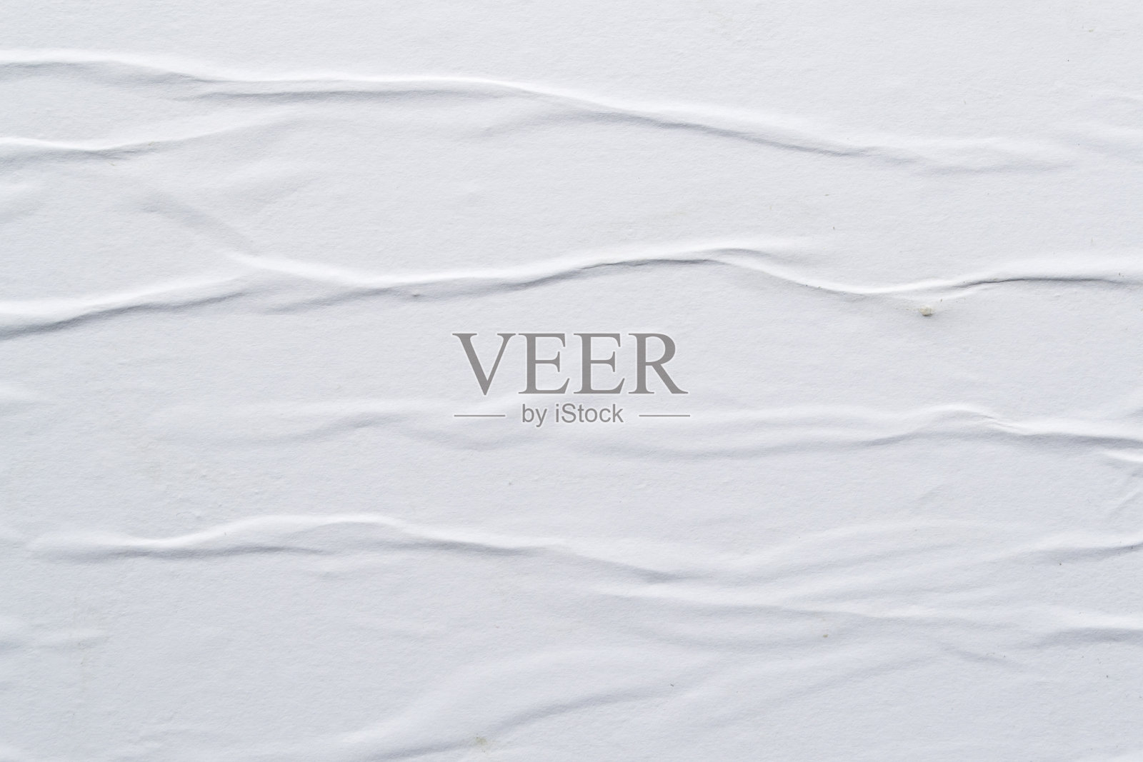 白色折痕海报纹理。抽象的背景。照片摄影图片