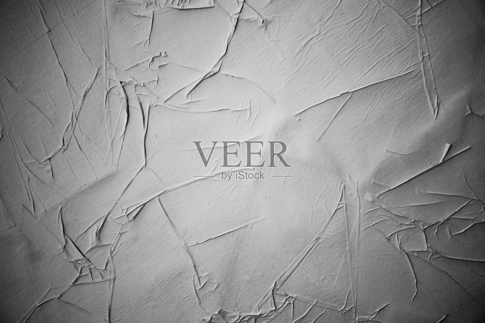 皱巴巴的海报，垃圾纸的纹理。照片摄影图片